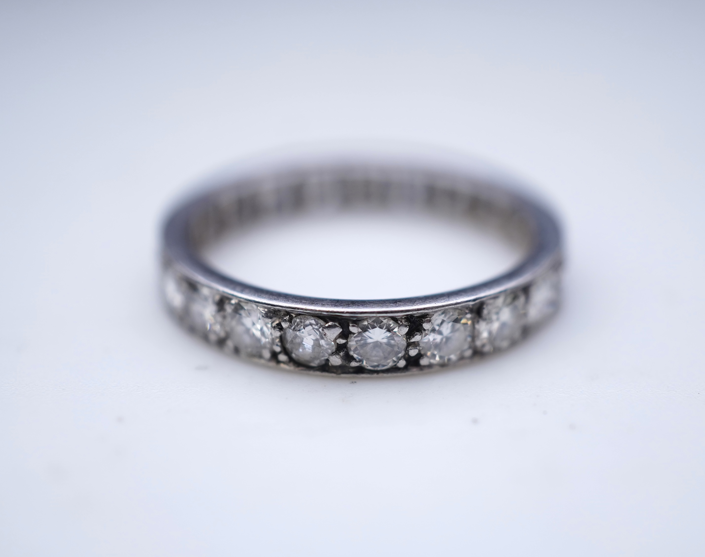 A diamond eternity ring, mid 20th century